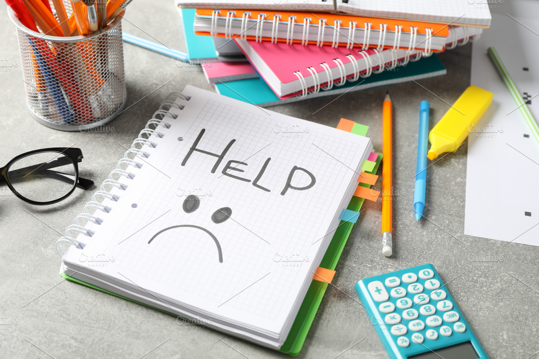 Inscription Help and stationary on grey background, close up, a School & Education Photo by AtlasStudio PRO