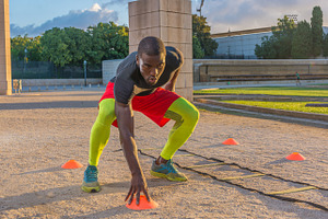 muscular male training in the street