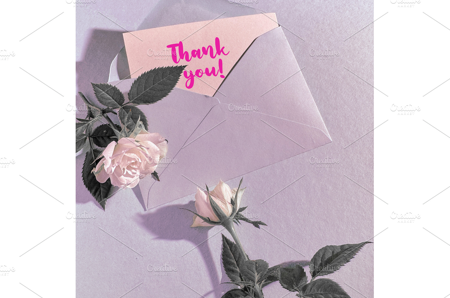 Open envelope with a pink thank you, a Photo by tilialucida