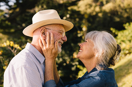 Cheerful senior couple smiling at each other and expressing thei, a Person Photo by Jacob Lund