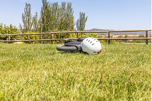 Electric unicycle with a helmet lie