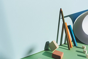 Pencil leaning against the blue wall featuring pencil, back, and school
