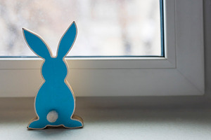 Blue wooden bunny figurine standing, a Holiday Photo by Imaginarium