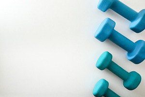 Blue Dumbbells on Minimal White Background, a Sports & Recreation Photo by Davizro's Market