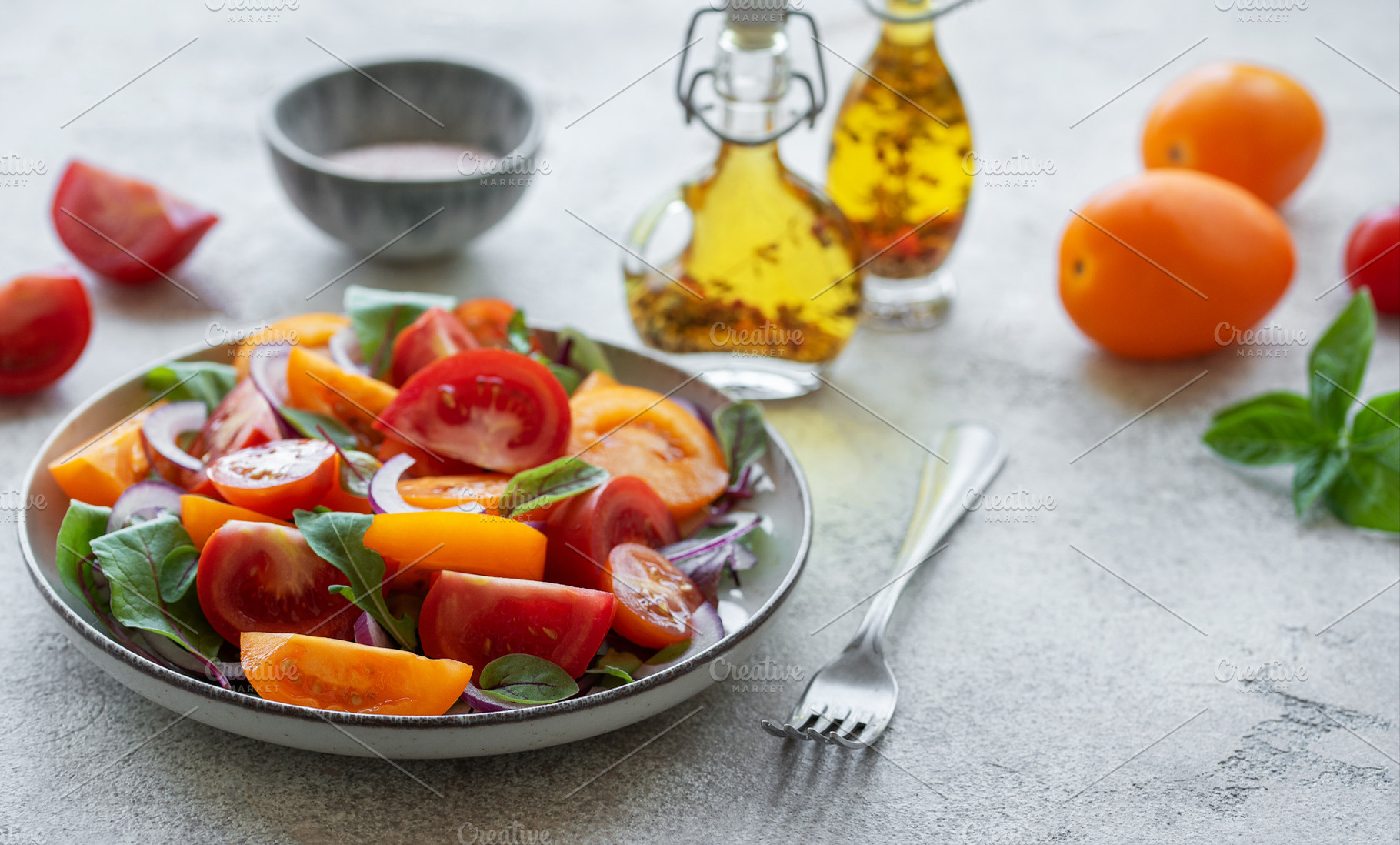 Green salad from leaves and tomatoes, a Food & Drink Photo by Olena Rudo