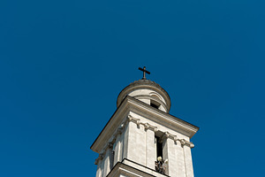 Historic church bell tower with cross, located in central Chisin, a Nature Photo by Ales Munt