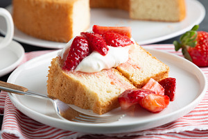 Angel food cake with whipped cream a stock photo containing cake and angel