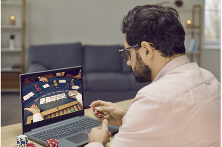 Young gambling man takes part in, a Person Photo by StudioRomantic