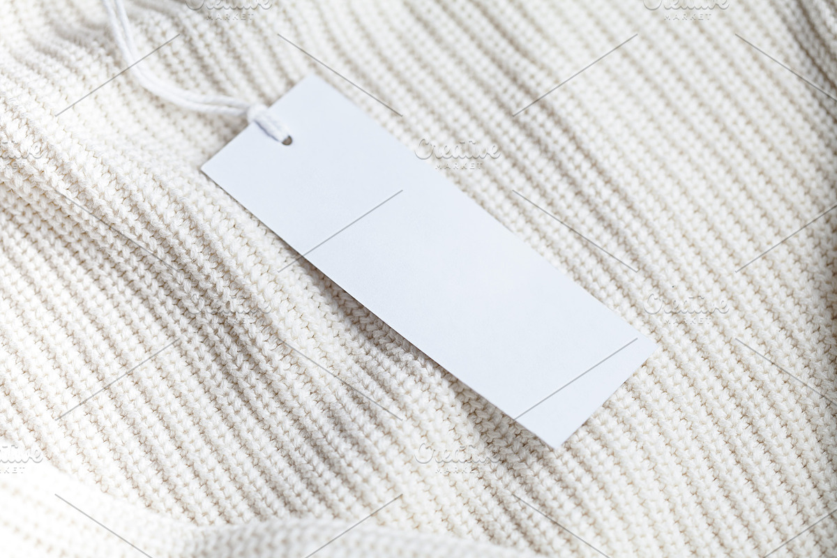 Clothes label tag blank white mockup, an Advertising Mockup by Olha Klein (Photo 2 of 3)