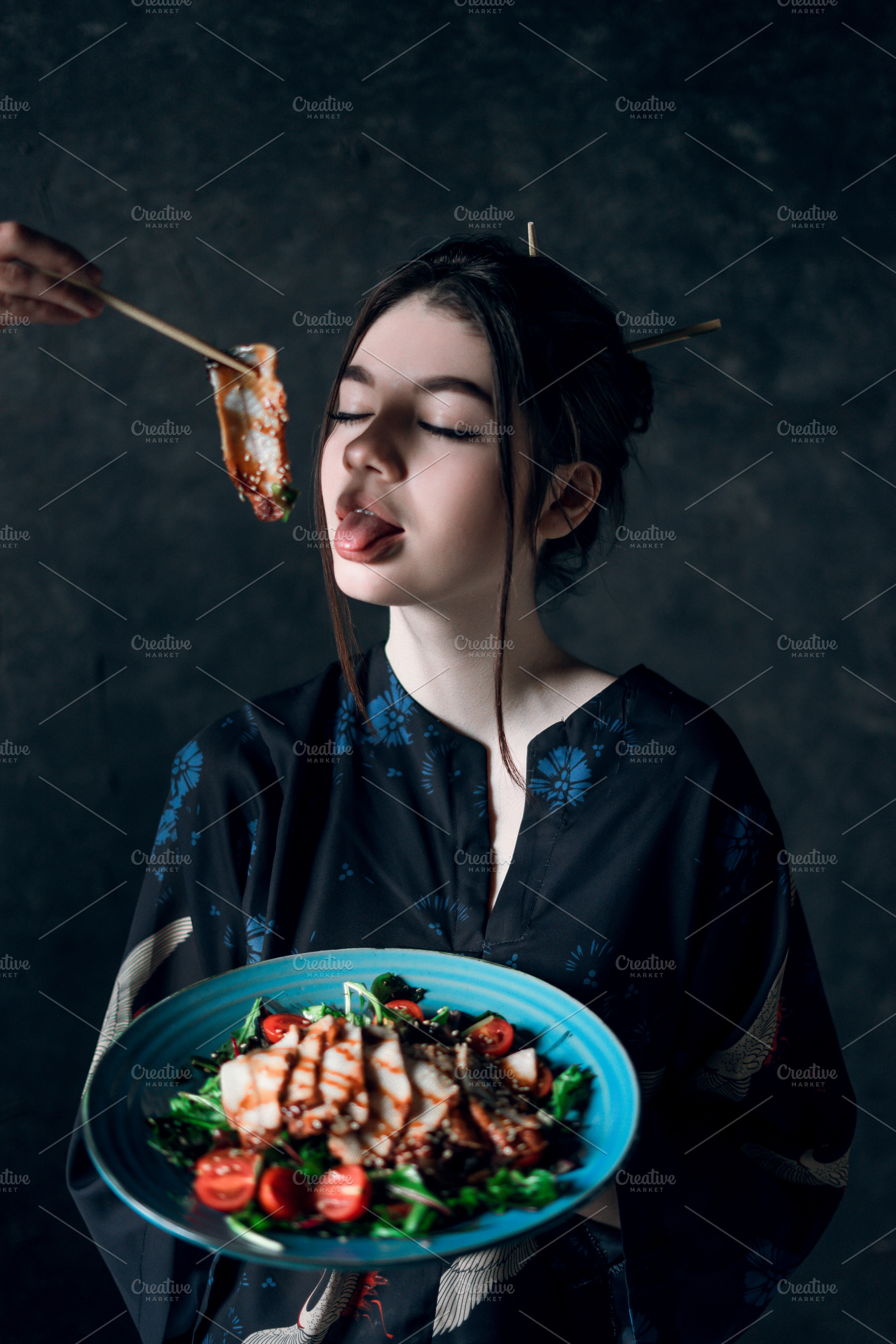 Cute girl with eel salad featuring health, tomato, and culture, a Food & Drink Photo by Elijah