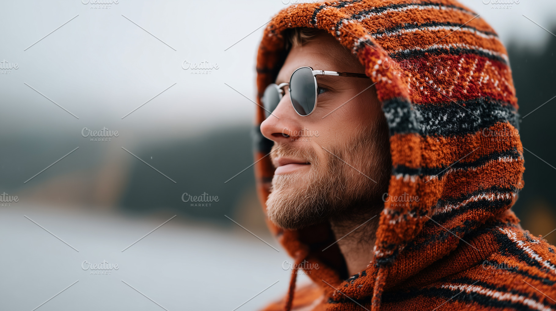 Man in a colorful hippie hoodie and, a Person Photo by MistyDay