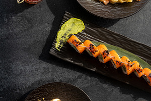 Assorted dishes food table served sushi cake cup, a Food & Drink Photo by Photo Drive Studio