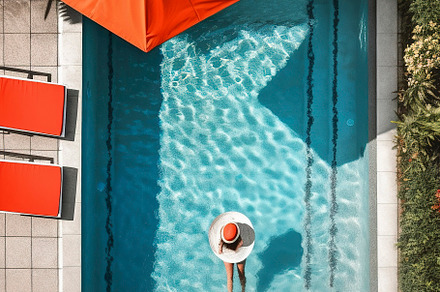 Girl in the pool from above, a Person Photo by huertas19