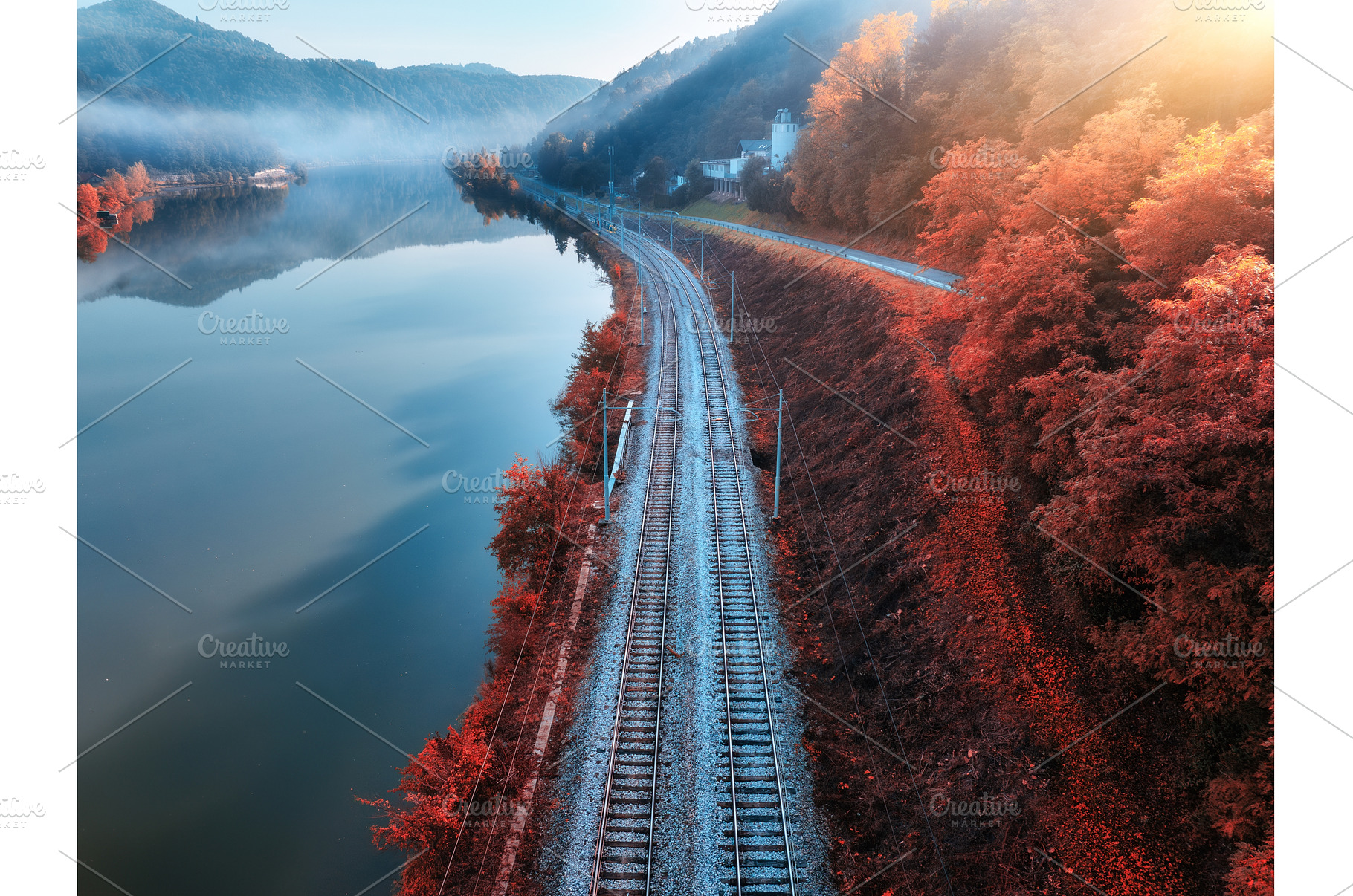 Aerial view of railroad, alpine lake, a Nature Photo by den-belitsky