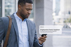 Businessman checks smartphone for ca, a Photo by Dvoevnore photos