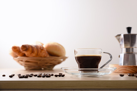 Coffee for breakfast on bench with pastries isolated background, a Food & Drink Photo by Davizro's Market