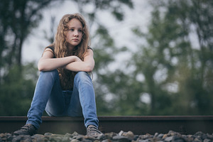 Portrait of young sad teen girl featuring sad, autism, and girl
