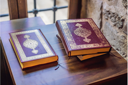 Quran holy book of Muslims in the, a School & Education Photo by Elizaveta Galitskaya