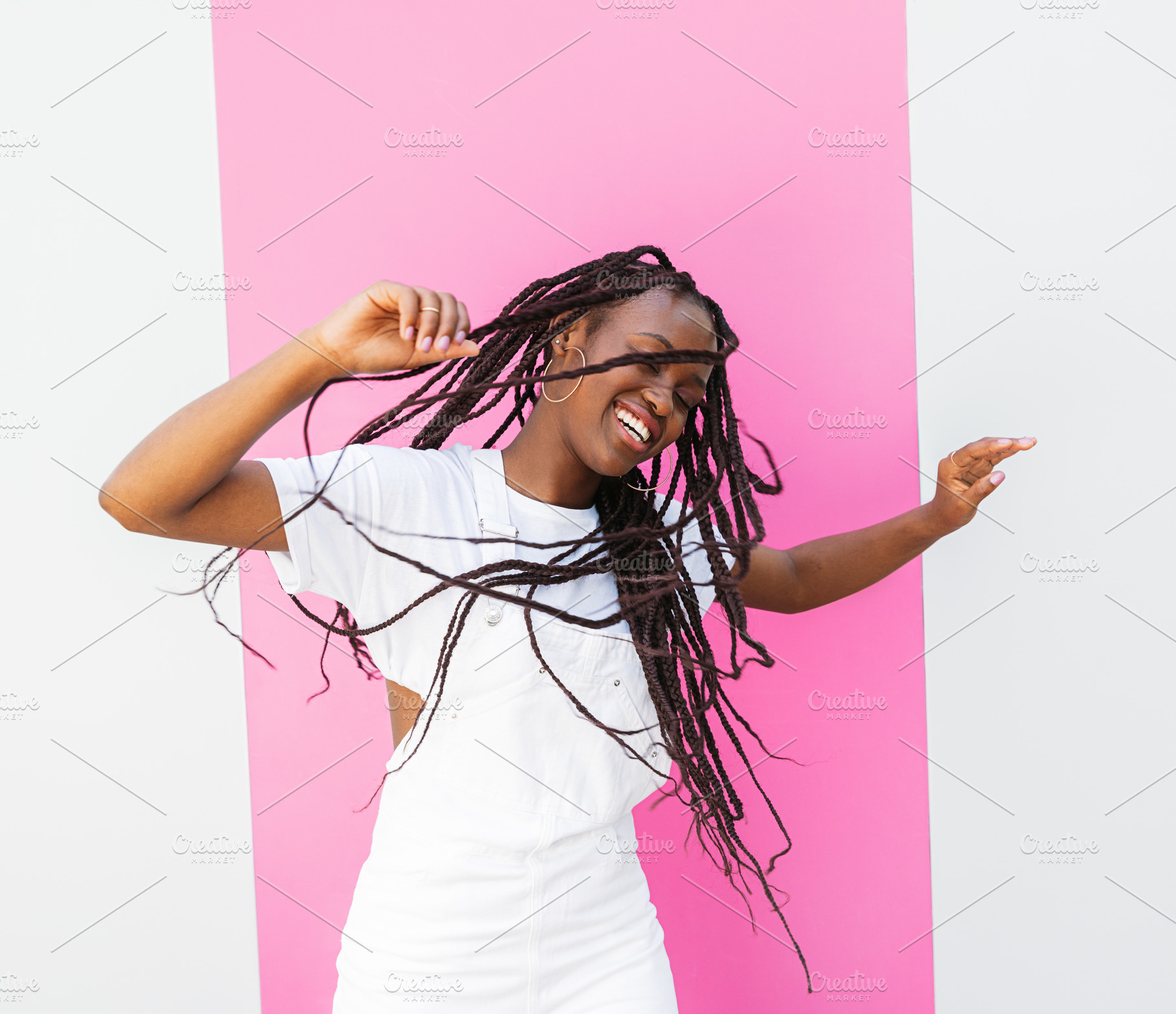Happy girl in white overall dancing, a Person Photo by Artem Varnitsin