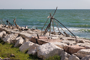 Wooden huts at the Murazzi beach on Pellestrina lagoon, a Nature Photo by Bepslabor
