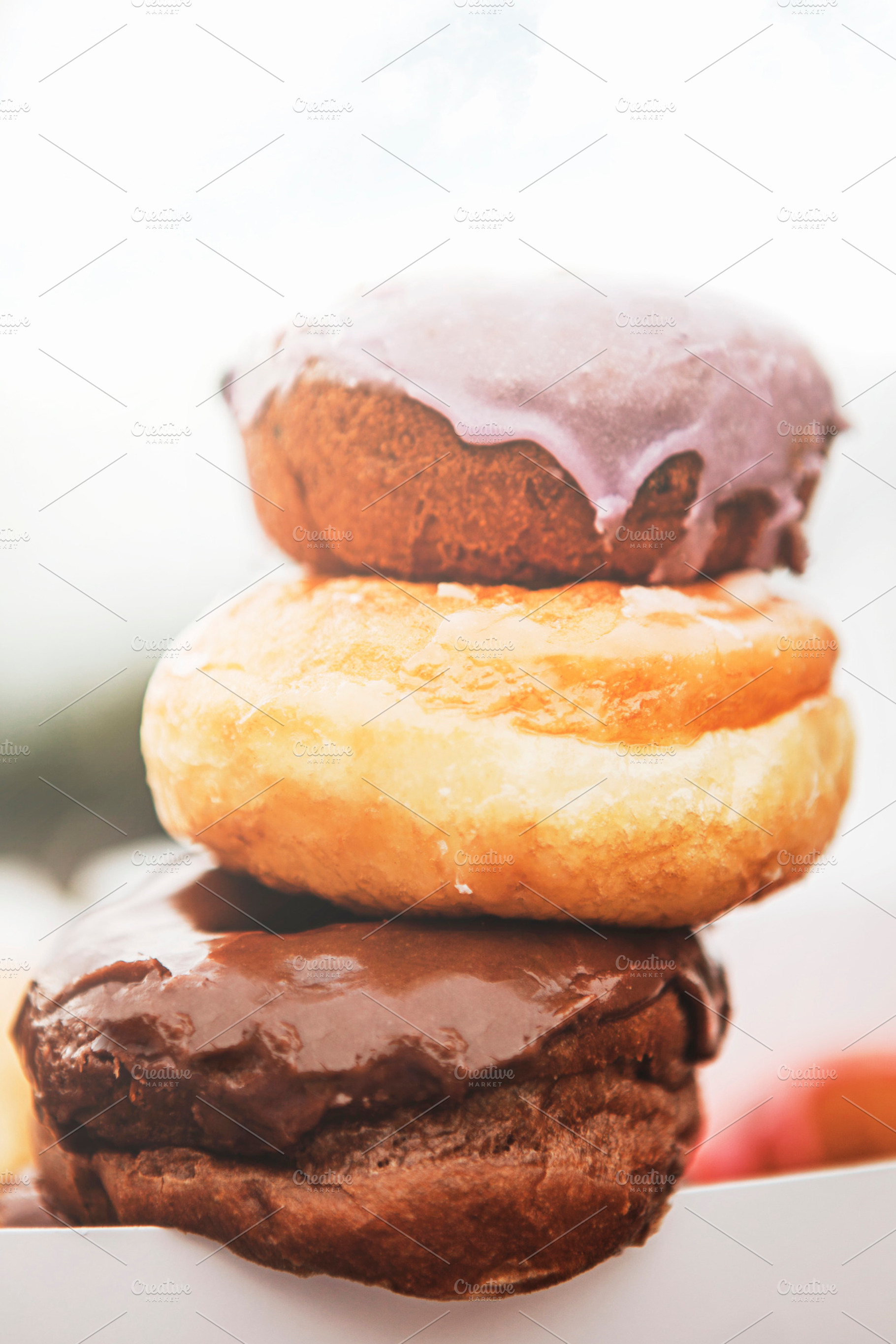 Tall Stack Of Various Donuts
