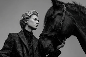 Young person stands by a horse, a Photo by Beautiful things