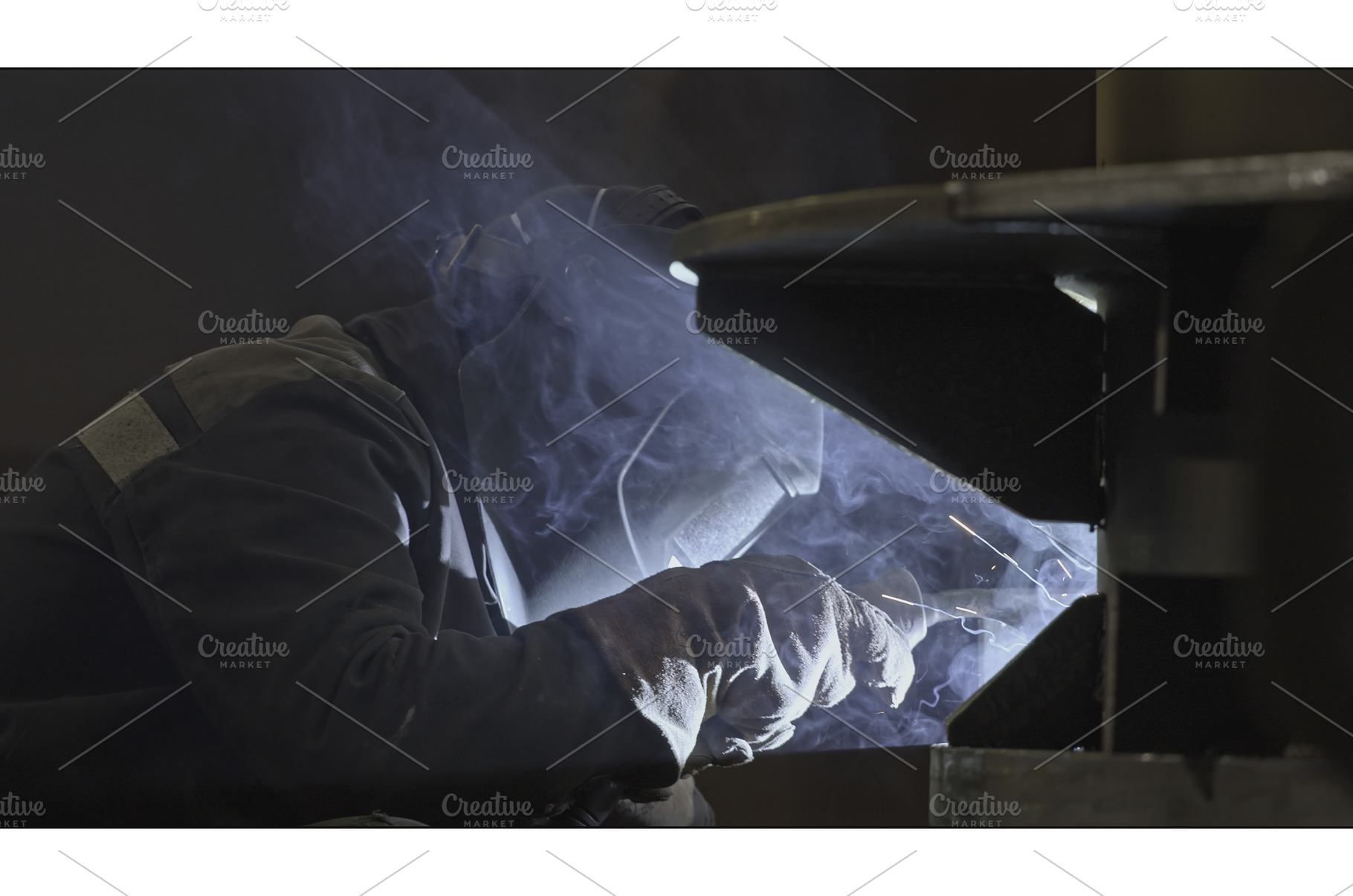 Welder welds metal structures at, an Industrial Photo by Media Whale Stock