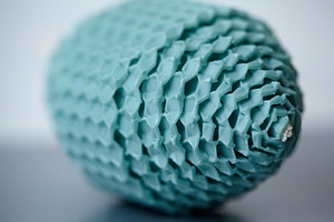 Macro View of a Teal Beeswax Egg Candle with Honeycomb Texture and Shallow Dept, a Holiday Photo by Rohan Photography