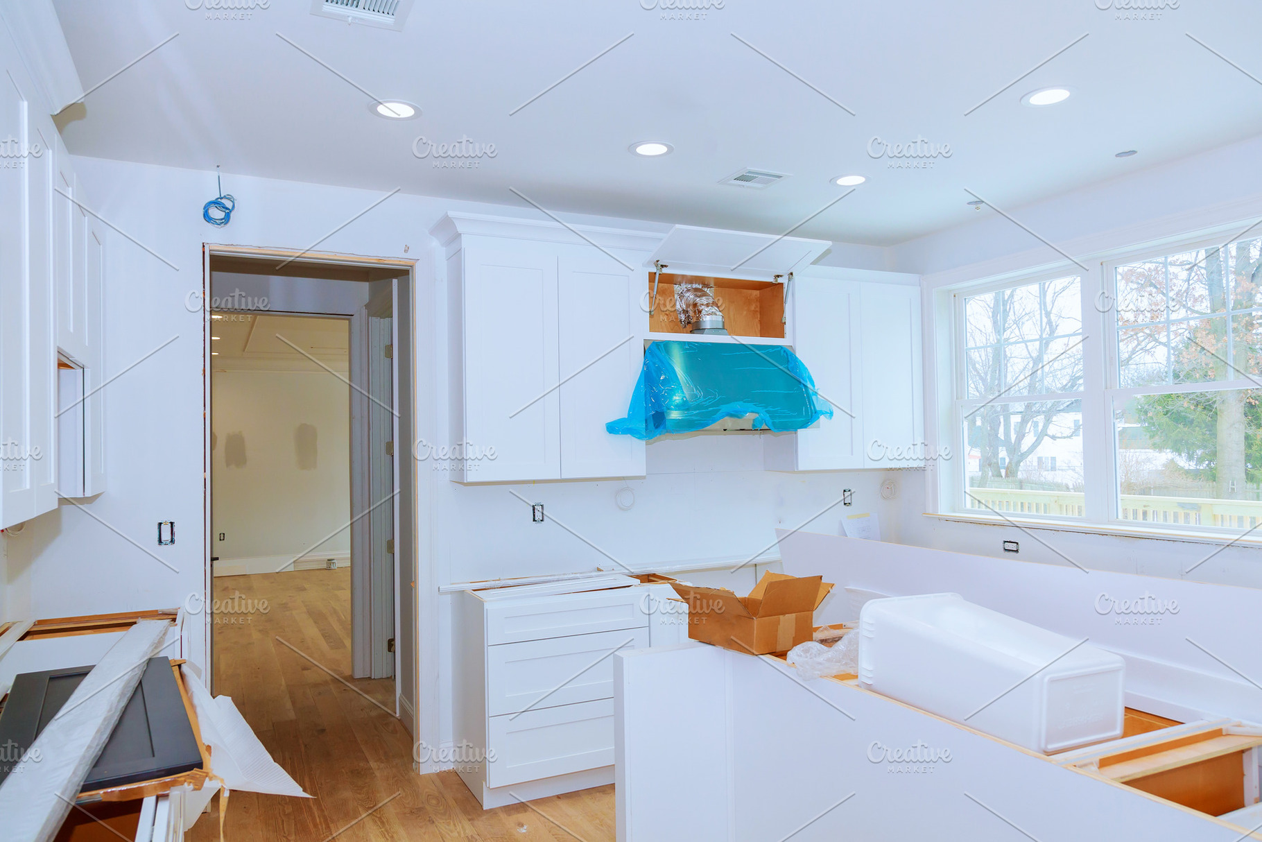 Installation of kitchen installs kit, an Industrial Photo by Ungvar Studio