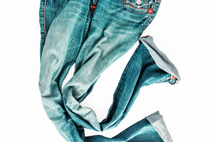 Beautiful casual jeans pants and clothes isolated on white backg, a Beauty & Fashion Photo by TanaCh