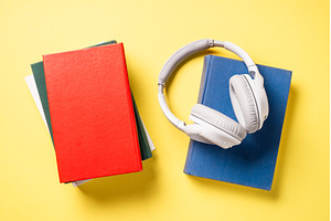 Headphones and books on yellow, a School & Education Photo by Nadia-nb