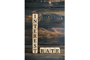 INTEREST RATE formed with wood, a Business Photo by Gladkov photography