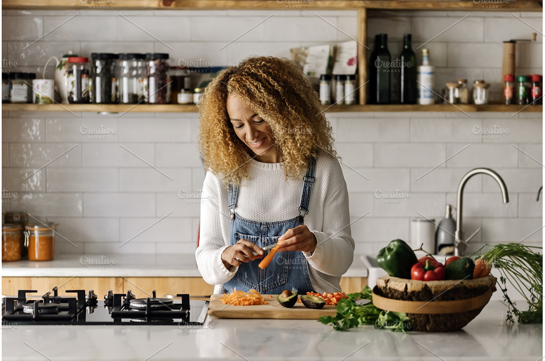 Woman preparing food in kitchen., a Person Photo by nunezimage