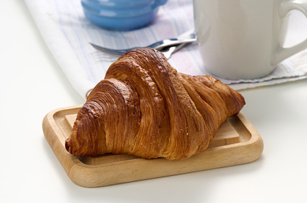 Fresh croissant on a white background., a Food & Drink Photo by ndanko