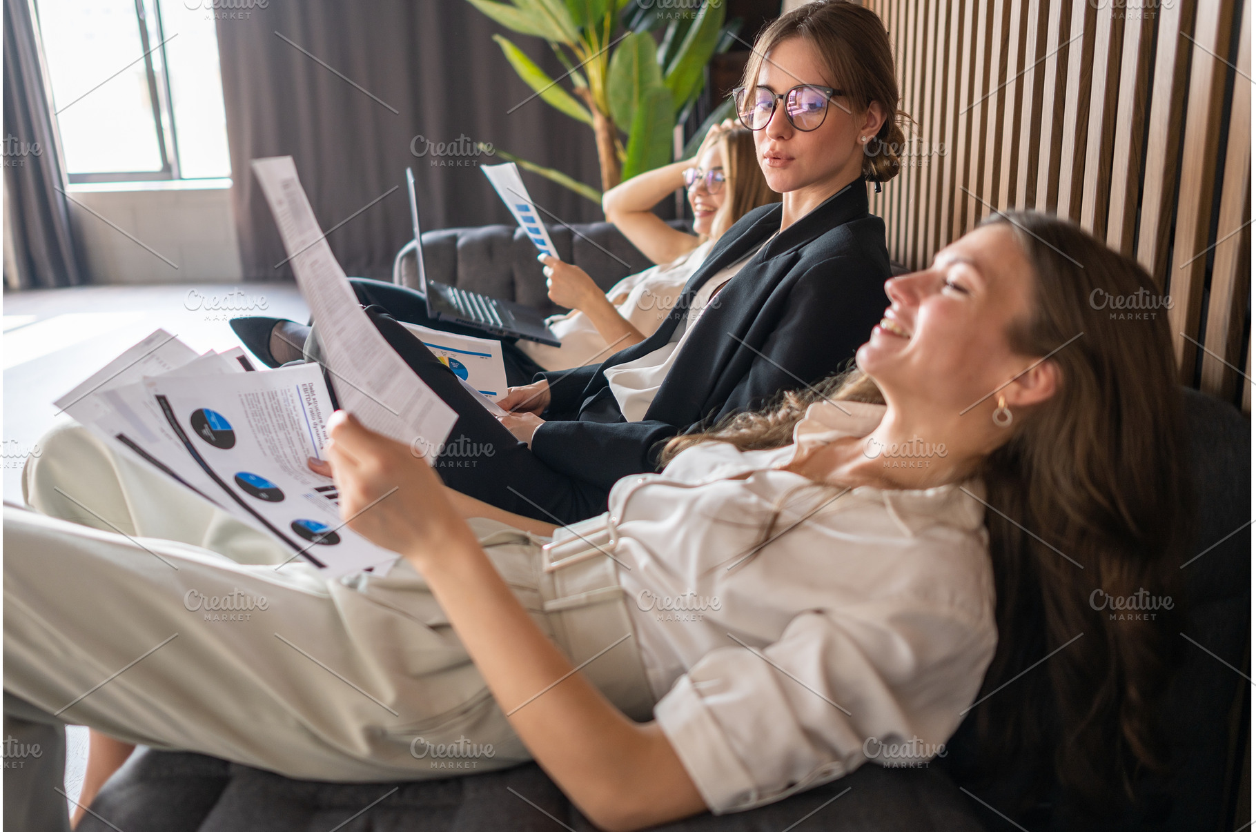 Female team enjoying a quiet office, a Person Photo by undrey