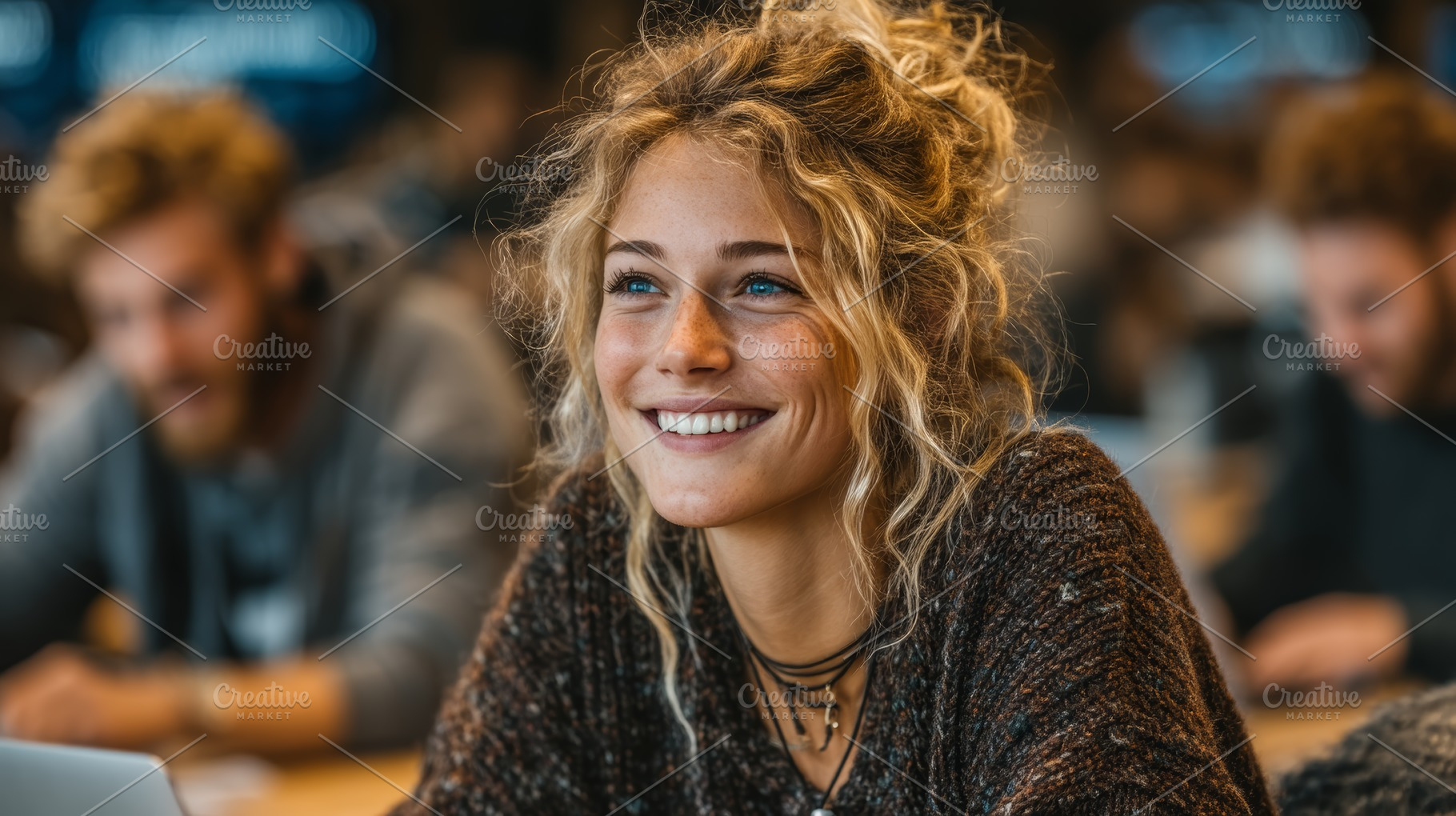 Smiling student at a collaborative workspace engaging in a cheerful atmosphere, a Photo by AS photostudio