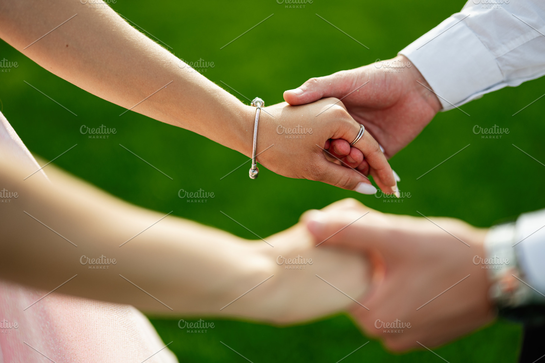 Close-up of couple holding hands with a romantic and emotional connection, a Photo by AS photostudio