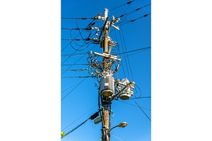 Electrical power line cables and transformers in Japan, an Industrial Photo by Leonid Andronov