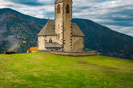 St Jakob church on the green field, an Architecture Photo by Alpine Dreams