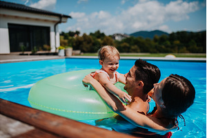 Parents and child having fun with
