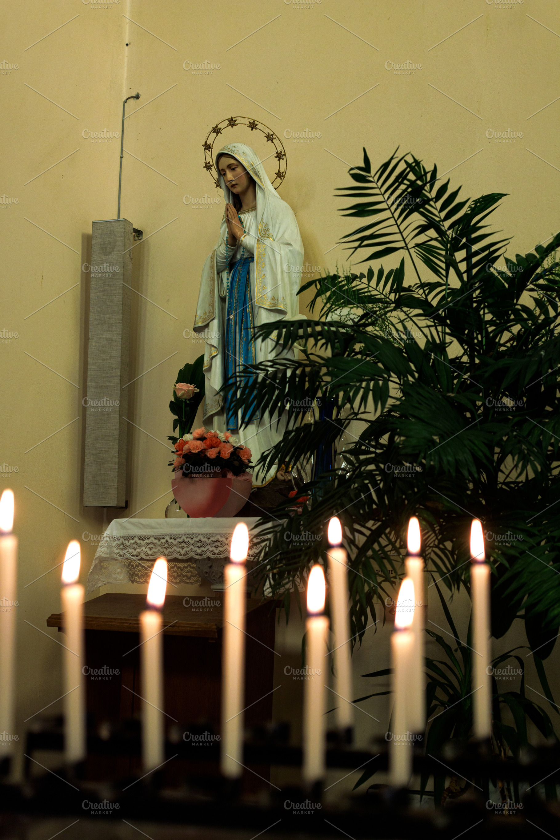 Church interior with a statue of the Madonna, a School & Education Photo by Bepslabor
