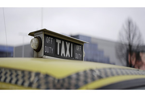 Yellow taxi sign showing off duty, a Transportation Photo by Media Whale Stock