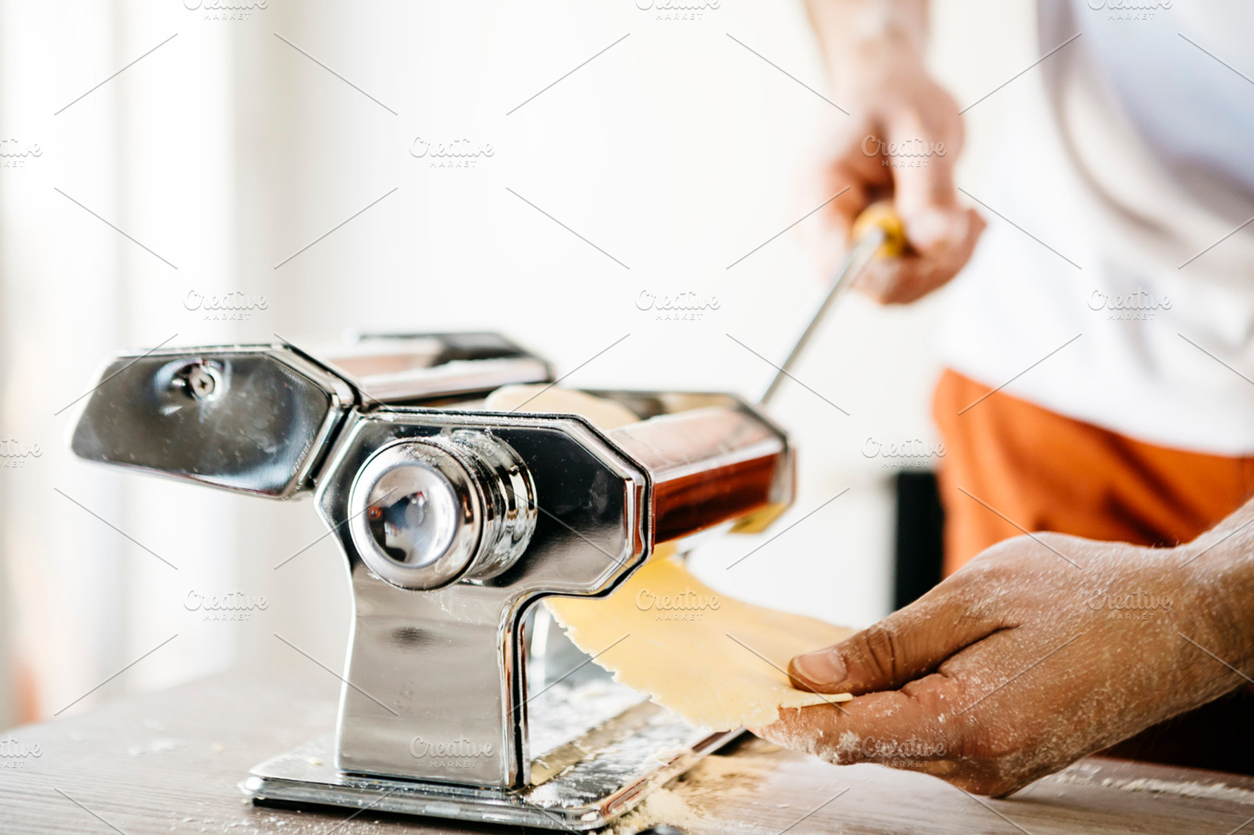 Making pasta containing pasta, ravioli, and making, a Food & Drink Photo by fotopitu
