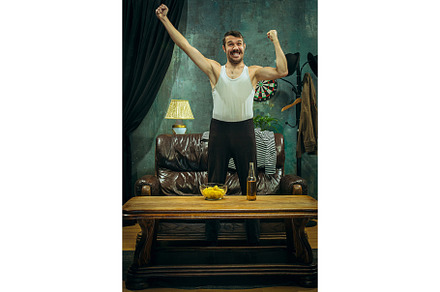 Winner overwhelmed cheerful man featuring match, fan, and football, a Sports & Recreation Photo by Volodymyr Melnyk