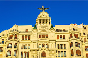 Ancient building at the crossroad of Carrer de Xativa and avenue, an Architecture Photo by Leonid Andronov