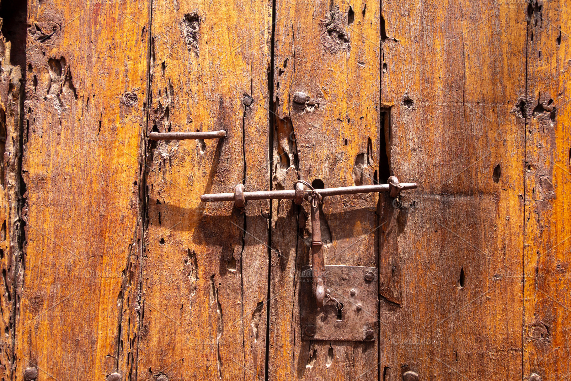 Wooden door close-up view with rusty, an Architecture Photo by GoodGoods