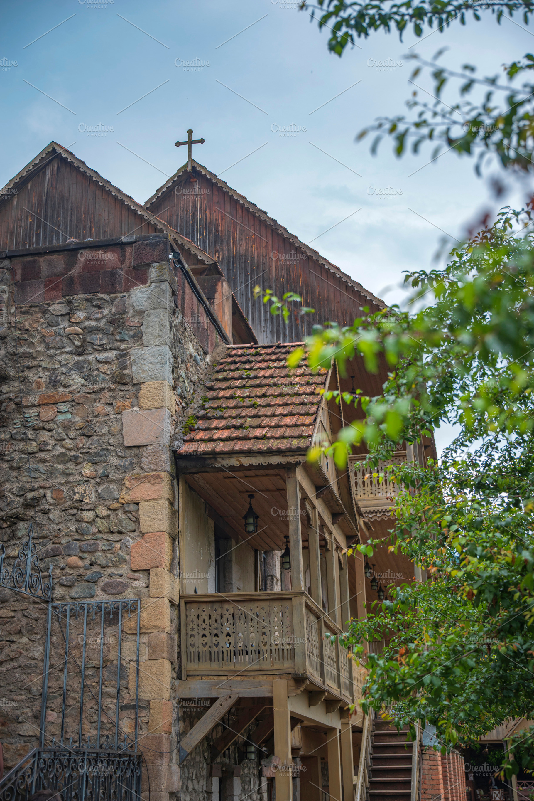 Traditional carved wooden balconies of an ancient monastery in A, a Photo by Pictures for you!!!!!!!!!