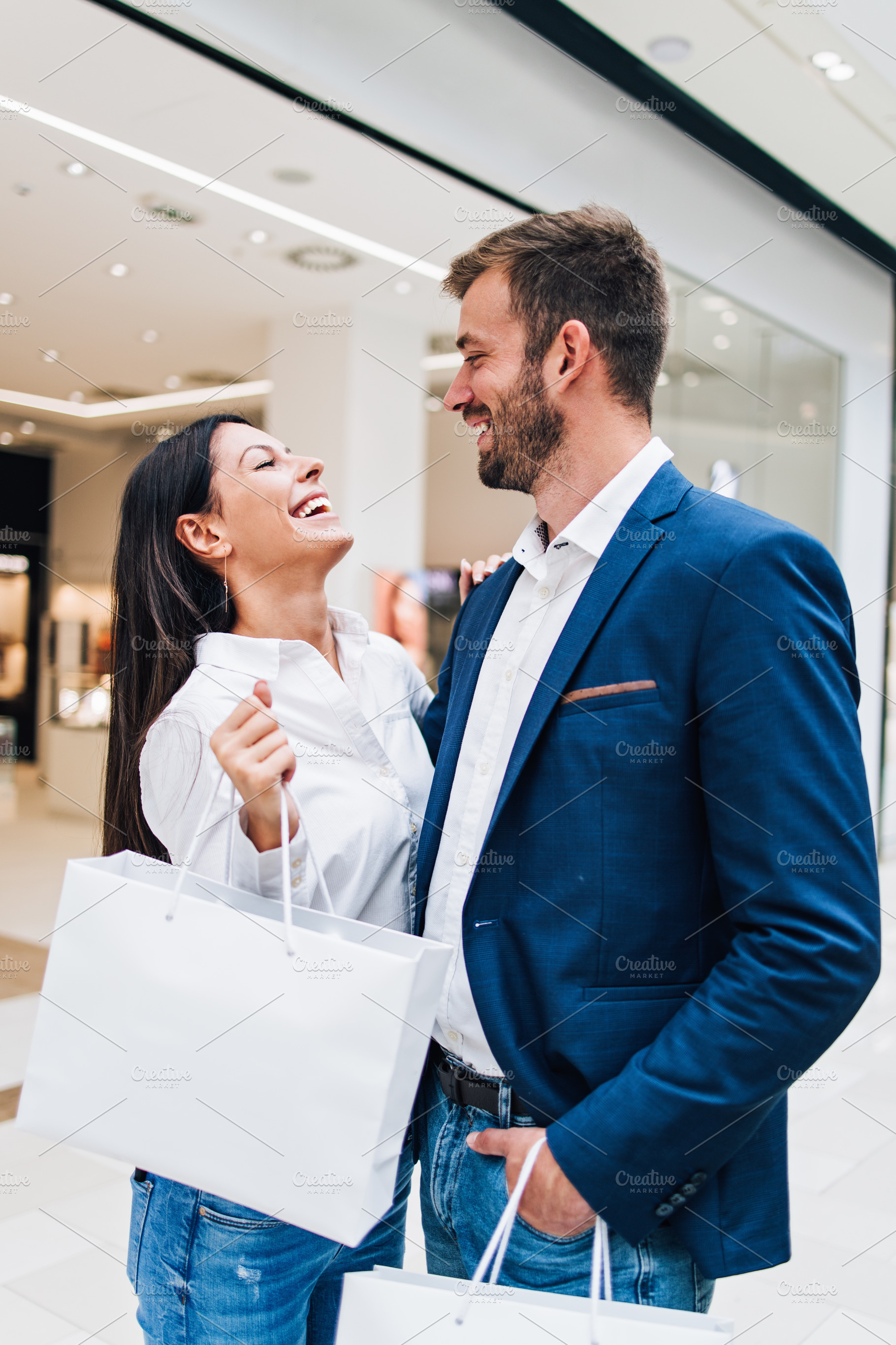 Shopping time containing shopping, mall, and black friday couple, a Person Photo by REDDOT Studio
