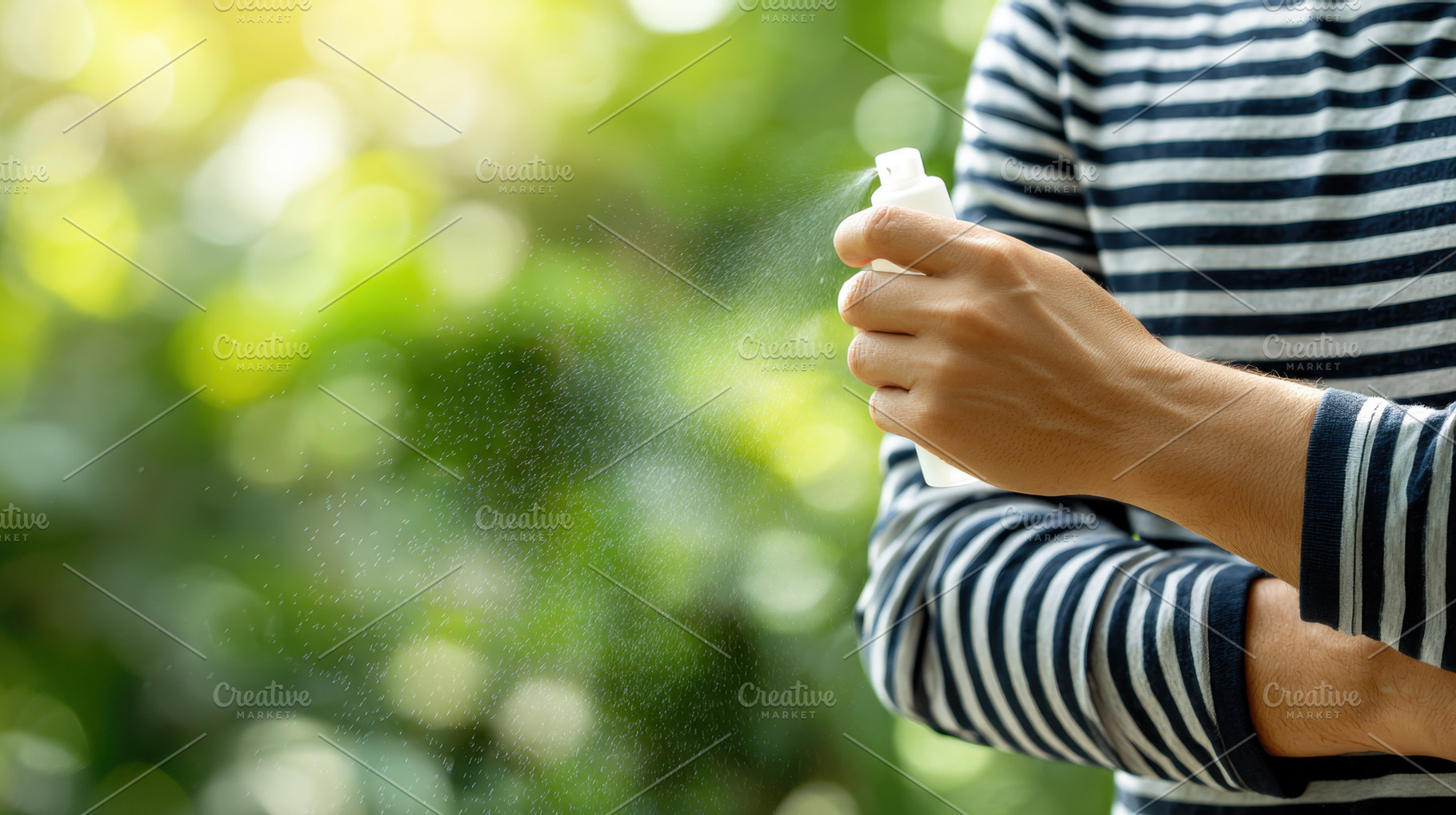Person using a spray bottle outdoors, a Photo by Beautiful things