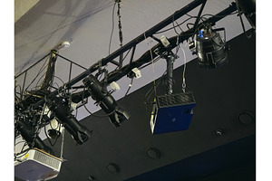 Lighting equipment hangs from the, an Industrial Photo by darksoul72